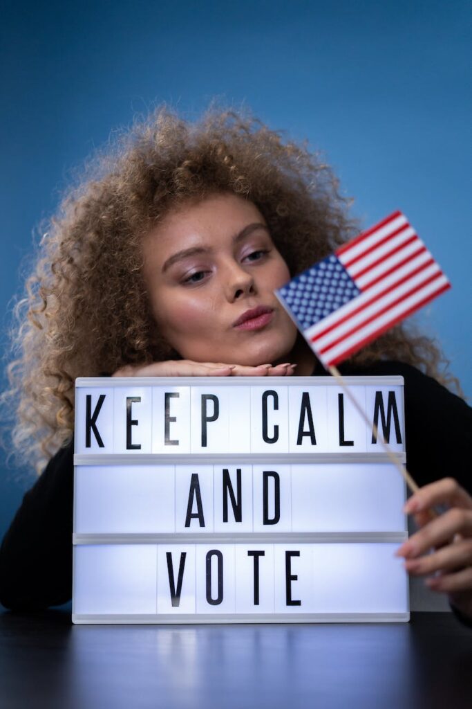 woman holding an american flag